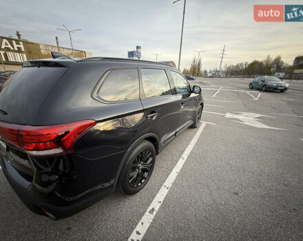 Черный Мицубиси Аутлендер, объемом двигателя 2.36 л и пробегом 153 тыс. км за 14800 $, фото 7 на Automoto.ua