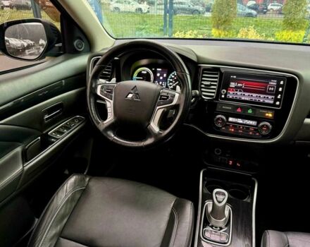 Чорний Міцубісі Аутлендер, об'ємом двигуна 2 л та пробігом 79 тис. км за 22900 $, фото 18 на Automoto.ua