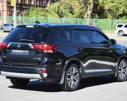 Черный Мицубиси Аутлендер, объемом двигателя 2.4 л и пробегом 130 тыс. км за 16200 $, фото 3 на Automoto.ua