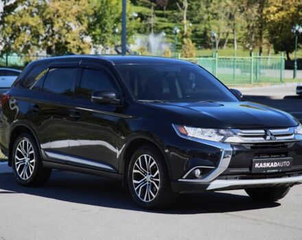 Черный Мицубиси Аутлендер, объемом двигателя 2.4 л и пробегом 130 тыс. км за 16200 $, фото 2 на Automoto.ua