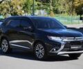 Черный Мицубиси Аутлендер, объемом двигателя 2.4 л и пробегом 130 тыс. км за 16200 $, фото 2 на Automoto.ua