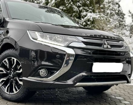 Черный Мицубиси Аутлендер, объемом двигателя 2 л и пробегом 65 тыс. км за 13200 $, фото 2 на Automoto.ua