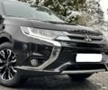Черный Мицубиси Аутлендер, объемом двигателя 2 л и пробегом 65 тыс. км за 13200 $, фото 2 на Automoto.ua