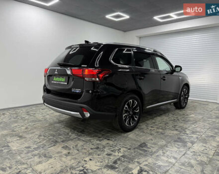 Чорний Міцубісі Аутлендер, об'ємом двигуна 2 л та пробігом 67 тис. км за 22999 $, фото 4 на Automoto.ua