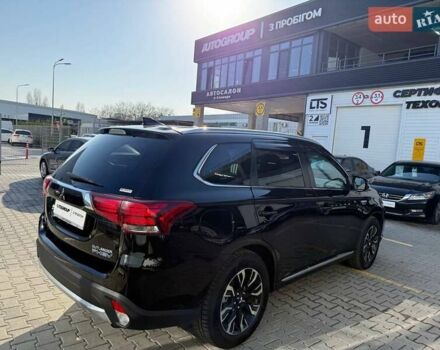 Черный Мицубиси Аутлендер, объемом двигателя 2 л и пробегом 67 тыс. км за 23000 $, фото 4 на Automoto.ua