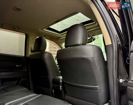 Чорний Міцубісі Аутлендер, об'ємом двигуна 2 л та пробігом 79 тис. км за 22900 $, фото 39 на Automoto.ua