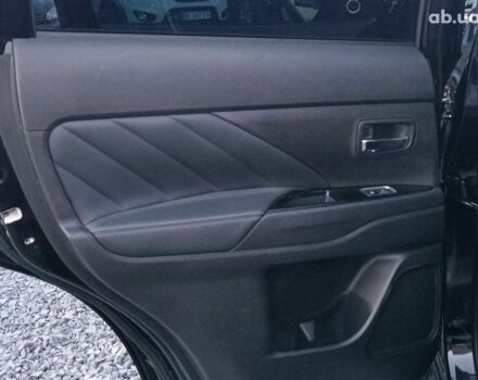 Черный Мицубиси Аутлендер, объемом двигателя 2 л и пробегом 115 тыс. км за 23700 $, фото 30 на Automoto.ua