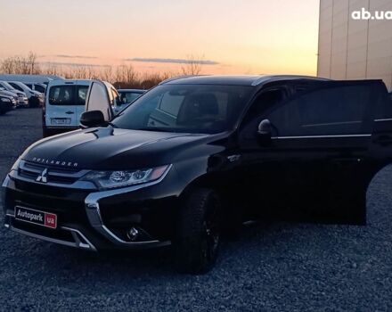 Черный Мицубиси Аутлендер, объемом двигателя 2 л и пробегом 115 тыс. км за 23700 $, фото 40 на Automoto.ua