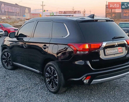 Чорний Міцубісі Аутлендер, об'ємом двигуна 2 л та пробігом 115 тис. км за 23700 $, фото 5 на Automoto.ua