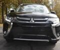 Чорний Міцубісі Аутлендер, об'ємом двигуна 2 л та пробігом 45 тис. км за 14000 $, фото 1 на Automoto.ua