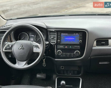 Чорний Міцубісі Аутлендер, об'ємом двигуна 2.36 л та пробігом 169 тис. км за 13450 $, фото 27 на Automoto.ua