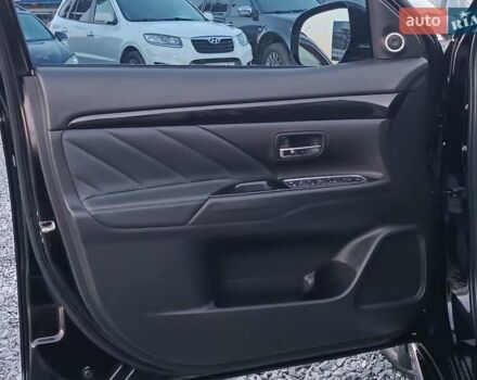 Чорний Міцубісі Аутлендер, об'ємом двигуна 2 л та пробігом 115 тис. км за 23700 $, фото 17 на Automoto.ua