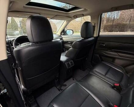 Черный Мицубиси Аутлендер, объемом двигателя 2.36 л и пробегом 91 тыс. км за 18300 $, фото 10 на Automoto.ua