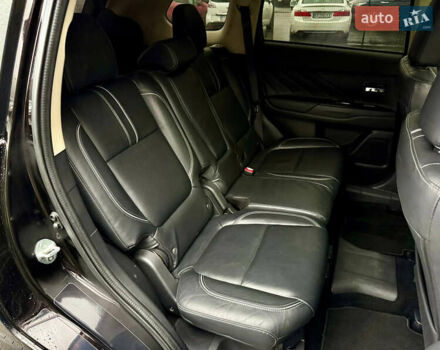 Чорний Міцубісі Аутлендер, об'ємом двигуна 2 л та пробігом 79 тис. км за 22900 $, фото 38 на Automoto.ua
