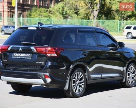 Черный Мицубиси Аутлендер, объемом двигателя 2.4 л и пробегом 130 тыс. км за 16200 $, фото 5 на Automoto.ua