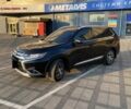 Черный Мицубиси Аутлендер, объемом двигателя 2.4 л и пробегом 75 тыс. км за 13000 $, фото 3 на Automoto.ua