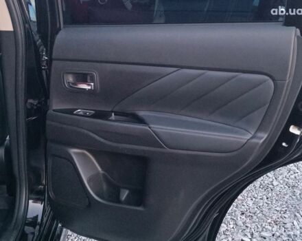 Черный Мицубиси Аутлендер, объемом двигателя 2 л и пробегом 115 тыс. км за 23700 $, фото 33 на Automoto.ua