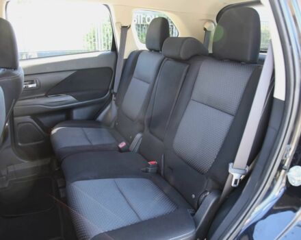 Черный Мицубиси Аутлендер, объемом двигателя 2.4 л и пробегом 130 тыс. км за 16200 $, фото 7 на Automoto.ua