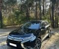 Черный Мицубиси Аутлендер, объемом двигателя 2.4 л и пробегом 105 тыс. км за 3000 $, фото 1 на Automoto.ua