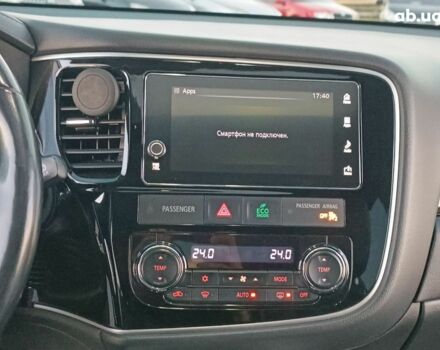 Черный Мицубиси Аутлендер, объемом двигателя 2 л и пробегом 115 тыс. км за 23700 $, фото 23 на Automoto.ua