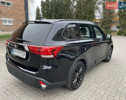 Чорний Міцубісі Аутлендер, об'ємом двигуна 2.36 л та пробігом 153 тис. км за 16450 $, фото 4 на Automoto.ua