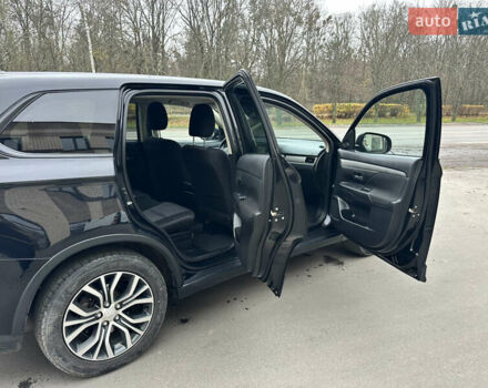 Чорний Міцубісі Аутлендер, об'ємом двигуна 2.36 л та пробігом 169 тис. км за 13450 $, фото 20 на Automoto.ua