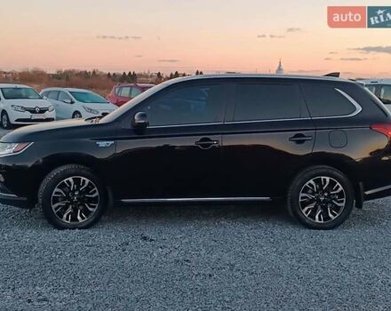 Чорний Міцубісі Аутлендер, об'ємом двигуна 2 л та пробігом 115 тис. км за 23700 $, фото 2 на Automoto.ua