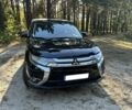 Черный Мицубиси Аутлендер, объемом двигателя 2.4 л и пробегом 105 тыс. км за 3000 $, фото 1 на Automoto.ua