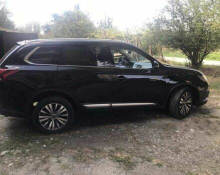 Черный Мицубиси Аутлендер, объемом двигателя 2.4 л и пробегом 125 тыс. км за 11200 $, фото 5 на Automoto.ua