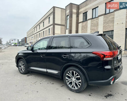 Чорний Міцубісі Аутлендер, об'ємом двигуна 2.36 л та пробігом 169 тис. км за 13450 $, фото 9 на Automoto.ua