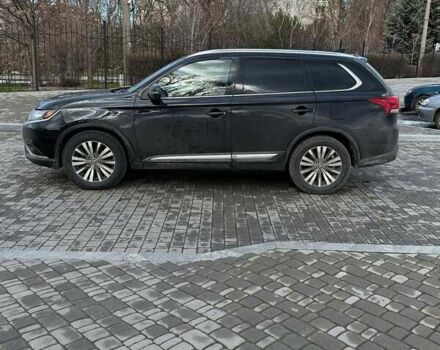 Черный Мицубиси Аутлендер, объемом двигателя 2.36 л и пробегом 91 тыс. км за 18300 $, фото 7 на Automoto.ua