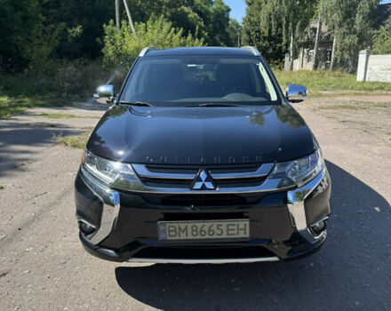 Черный Мицубиси Аутлендер, объемом двигателя 2 л и пробегом 54 тыс. км за 21500 $, фото 2 на Automoto.ua