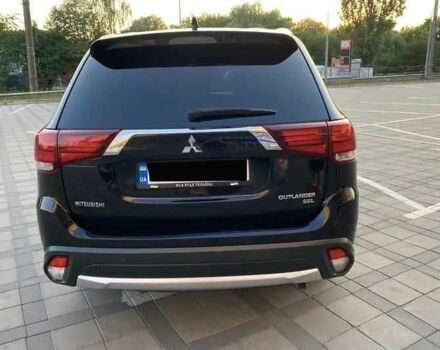 Черный Мицубиси Аутлендер, объемом двигателя 2.4 л и пробегом 75 тыс. км за 13000 $, фото 4 на Automoto.ua