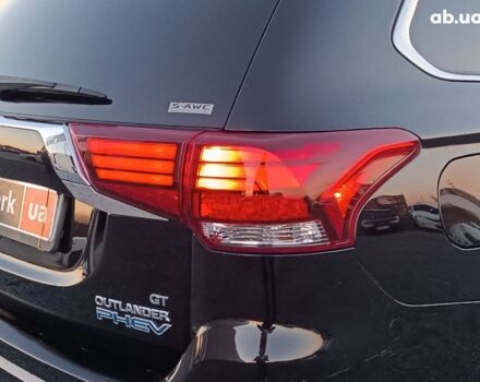 Черный Мицубиси Аутлендер, объемом двигателя 2 л и пробегом 115 тыс. км за 23700 $, фото 8 на Automoto.ua