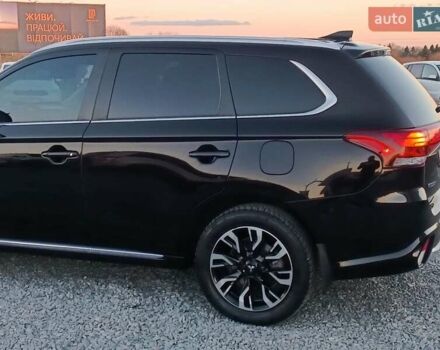 Чорний Міцубісі Аутлендер, об'ємом двигуна 2 л та пробігом 115 тис. км за 23700 $, фото 4 на Automoto.ua