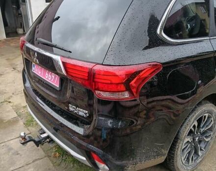 Чорний Міцубісі Аутлендер, об'ємом двигуна 2 л та пробігом 96 тис. км за 22000 $, фото 3 на Automoto.ua