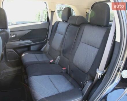 Черный Мицубиси Аутлендер, объемом двигателя 2.4 л и пробегом 130 тыс. км за 16200 $, фото 7 на Automoto.ua