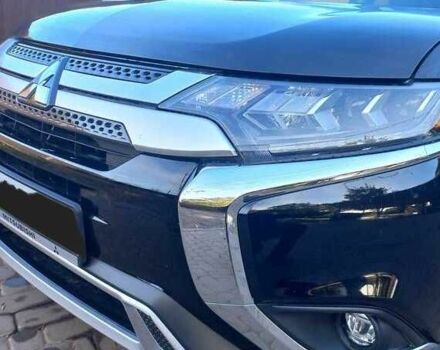 Черный Мицубиси Аутлендер, объемом двигателя 2.4 л и пробегом 132 тыс. км за 17600 $, фото 1 на Automoto.ua