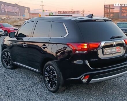 Черный Мицубиси Аутлендер, объемом двигателя 2 л и пробегом 115 тыс. км за 23700 $, фото 5 на Automoto.ua