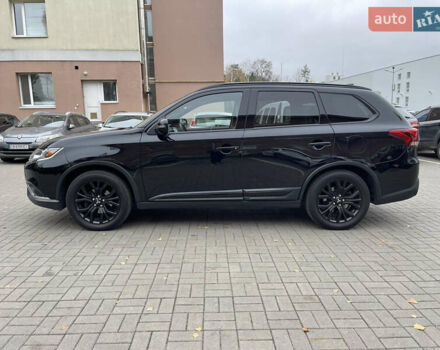 Чорний Міцубісі Аутлендер, об'ємом двигуна 2.36 л та пробігом 153 тис. км за 16450 $, фото 5 на Automoto.ua