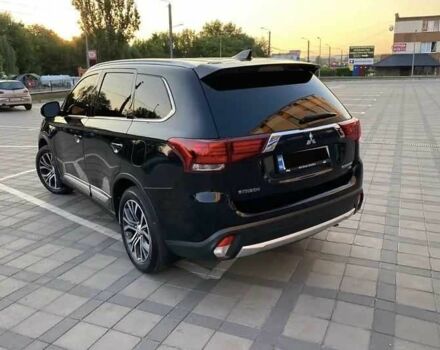 Черный Мицубиси Аутлендер, объемом двигателя 2.4 л и пробегом 75 тыс. км за 13000 $, фото 7 на Automoto.ua