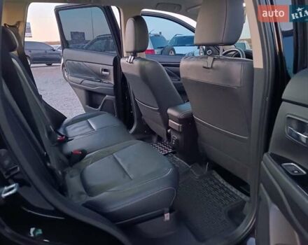 Чорний Міцубісі Аутлендер, об'ємом двигуна 2 л та пробігом 115 тис. км за 23700 $, фото 36 на Automoto.ua