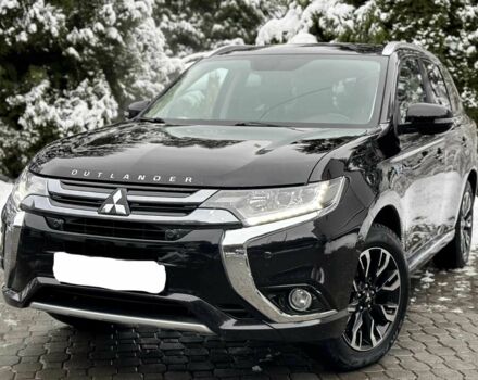 Черный Мицубиси Аутлендер, объемом двигателя 2 л и пробегом 65 тыс. км за 13200 $, фото 3 на Automoto.ua