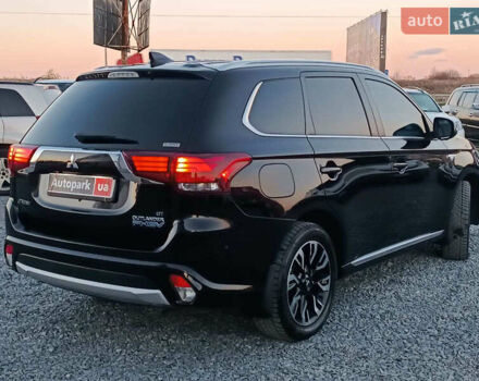 Чорний Міцубісі Аутлендер, об'ємом двигуна 2 л та пробігом 115 тис. км за 23700 $, фото 7 на Automoto.ua