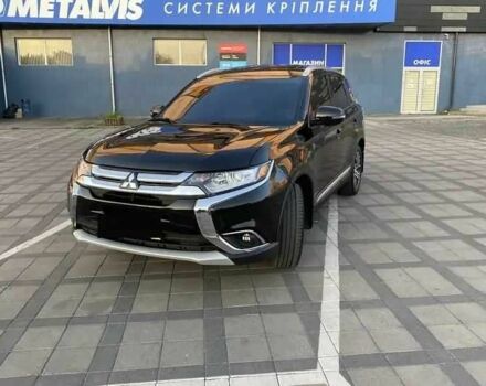 Черный Мицубиси Аутлендер, объемом двигателя 2.4 л и пробегом 75 тыс. км за 13000 $, фото 2 на Automoto.ua