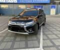 Черный Мицубиси Аутлендер, объемом двигателя 2.4 л и пробегом 75 тыс. км за 13000 $, фото 2 на Automoto.ua