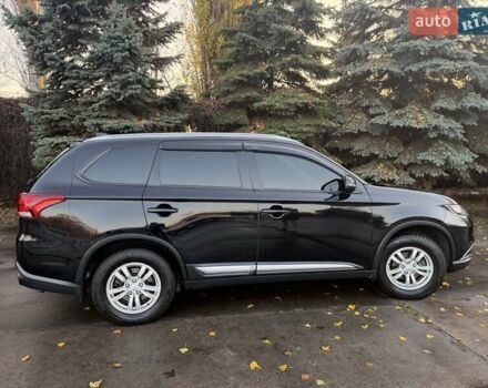 Чорний Міцубісі Аутлендер, об'ємом двигуна 2 л та пробігом 81 тис. км за 18950 $, фото 1 на Automoto.ua