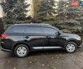Чорний Міцубісі Аутлендер, об'ємом двигуна 2 л та пробігом 81 тис. км за 18950 $, фото 1 на Automoto.ua