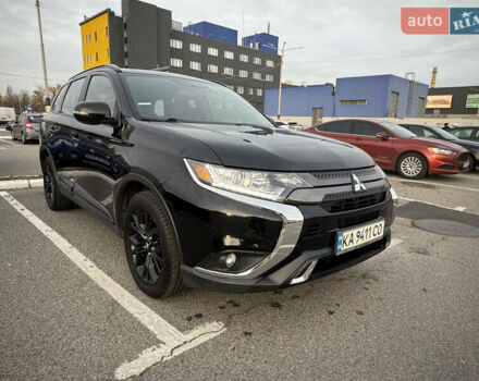 Черный Мицубиси Аутлендер, объемом двигателя 2.36 л и пробегом 153 тыс. км за 14800 $, фото 6 на Automoto.ua