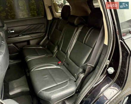 Чорний Міцубісі Аутлендер, об'ємом двигуна 2 л та пробігом 79 тис. км за 22900 $, фото 32 на Automoto.ua